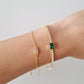 gold tennis emerald baguette bracelet