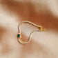 gold tennis emerald baguette bracelet